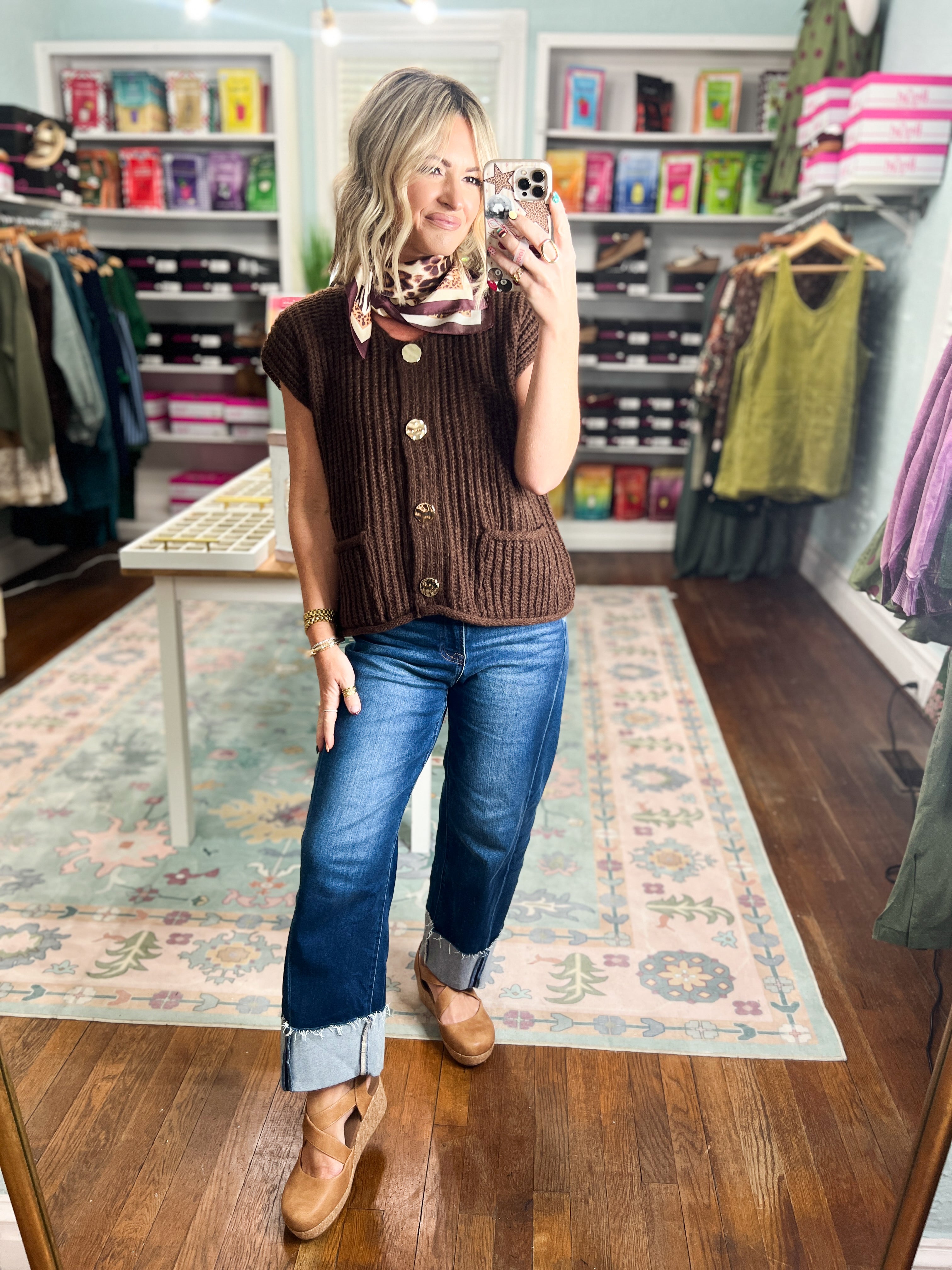 Chocolate brown knit sweater vest, sleeveless, button front with round buttons