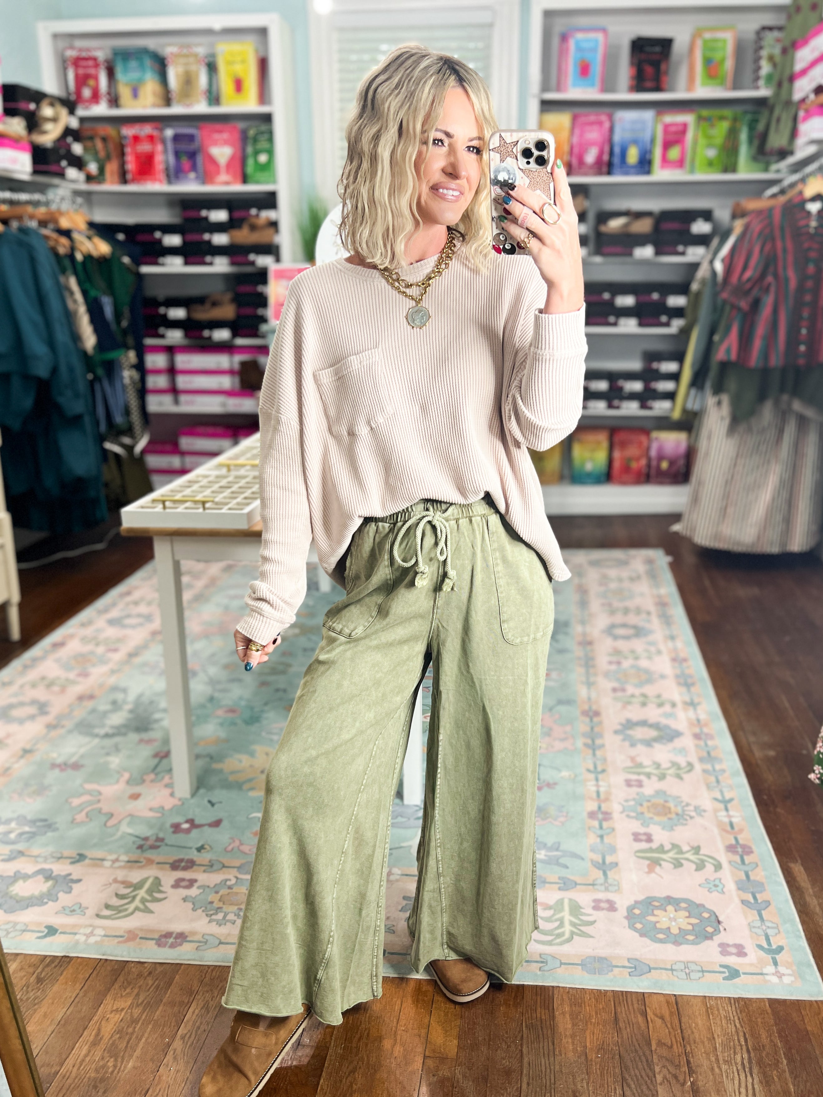 Light taupe mineral-washed long-sleeve pullover top with crew neck and chest pocket