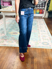 Deep blue mid-rise crop wide-leg jeans with pintuck front and ankle hem