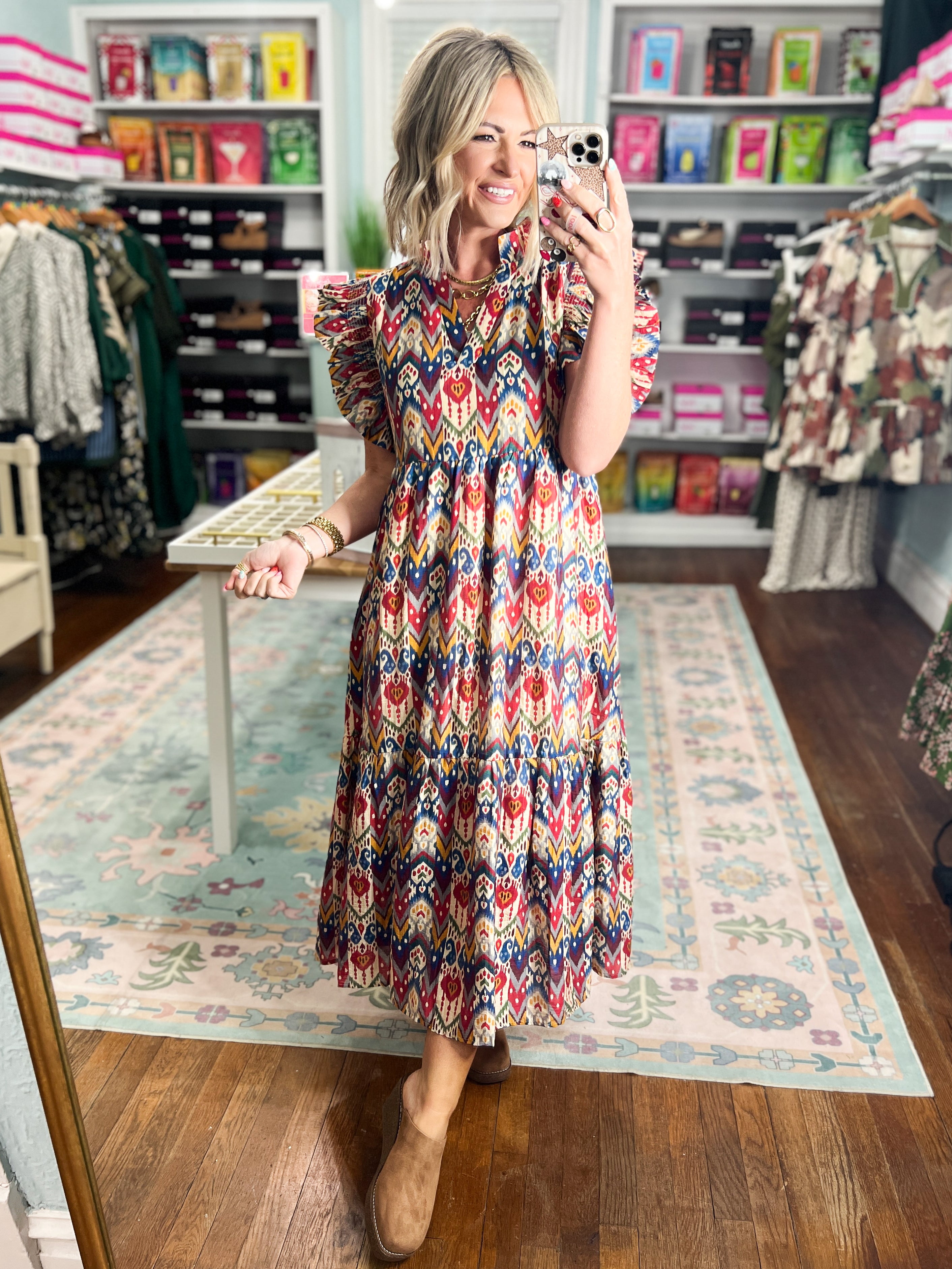 Multicolor tiered midi dress with geometric print and short ruffled sleeves, standing