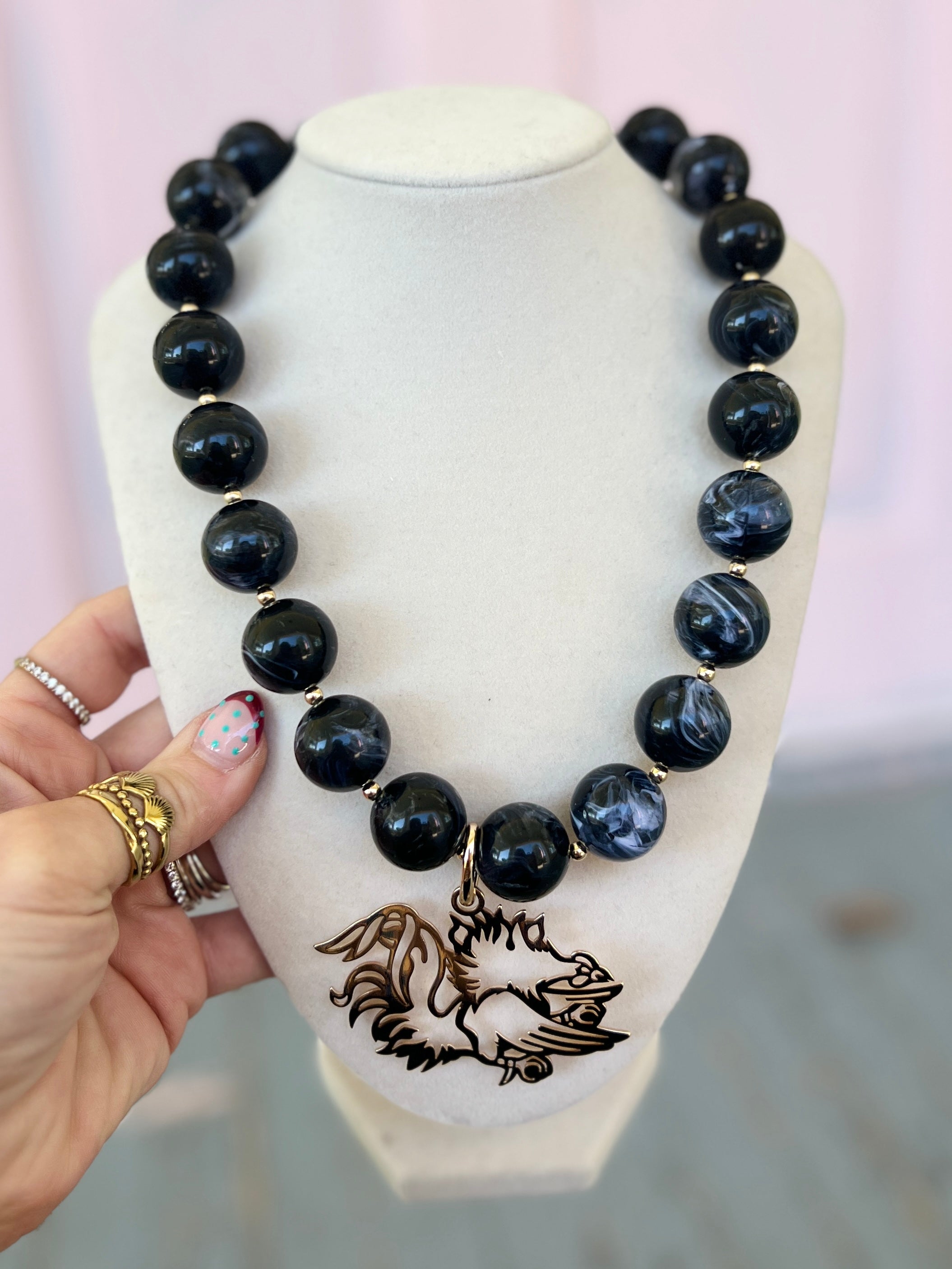 Black acrylic marble bead necklace with round beads and Gamecock pendant