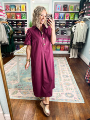 Wine midi dress front view with button-front placket and short sleeves