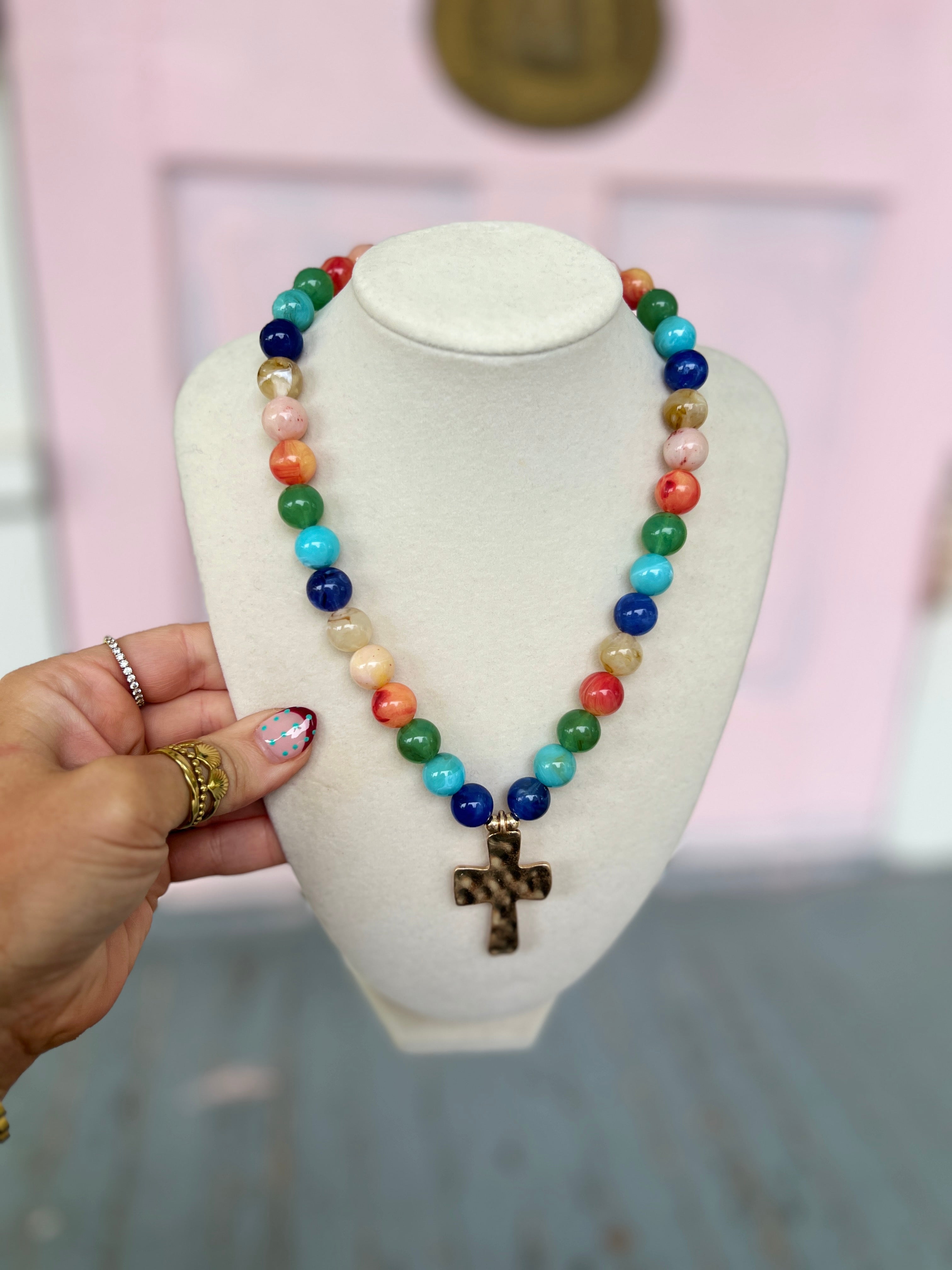 Multicolor beaded cross pendant necklace with hammered-style cross charm