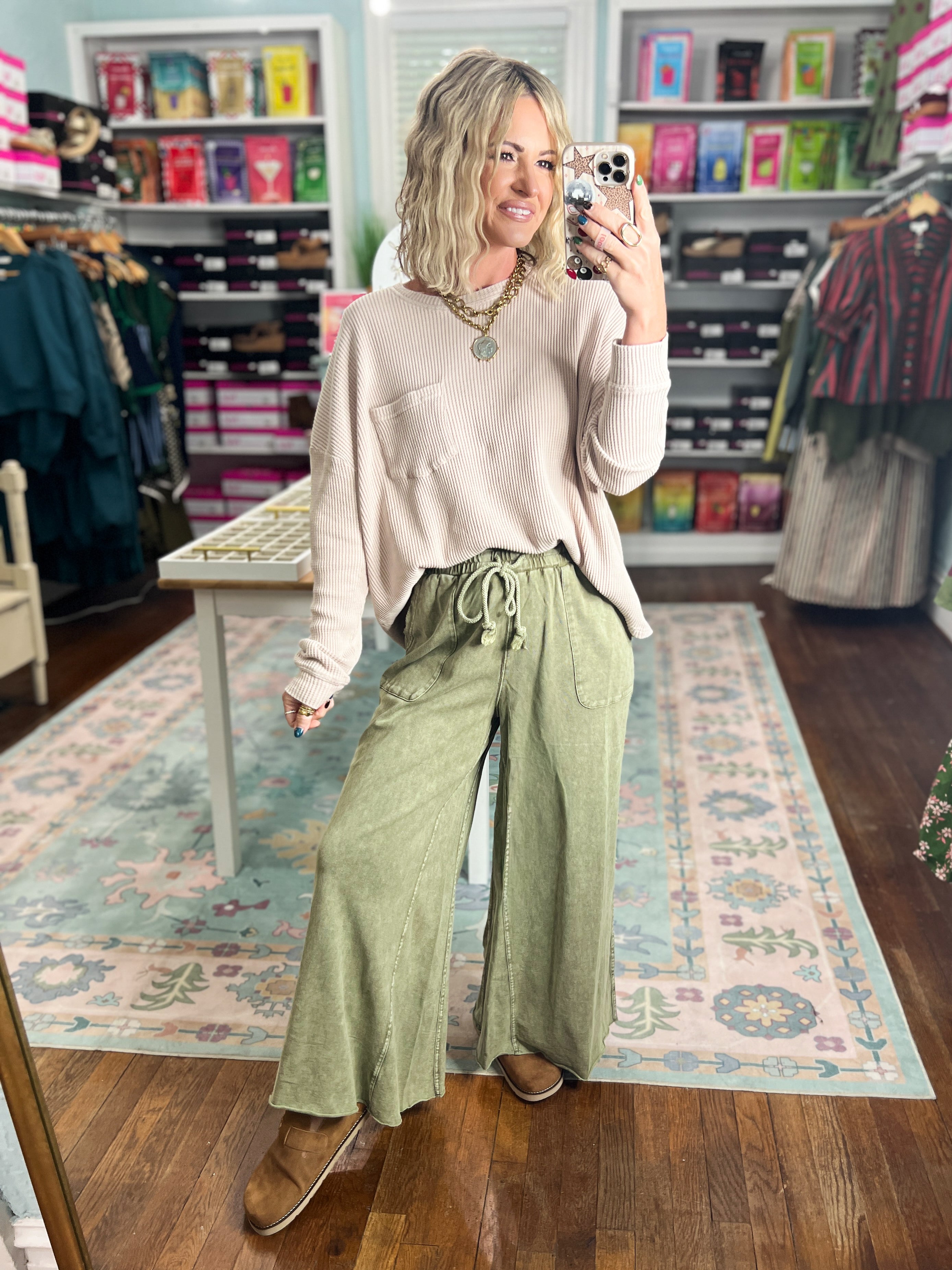 Sage green wide-leg pants with drawstring waist and tie, ankle-length