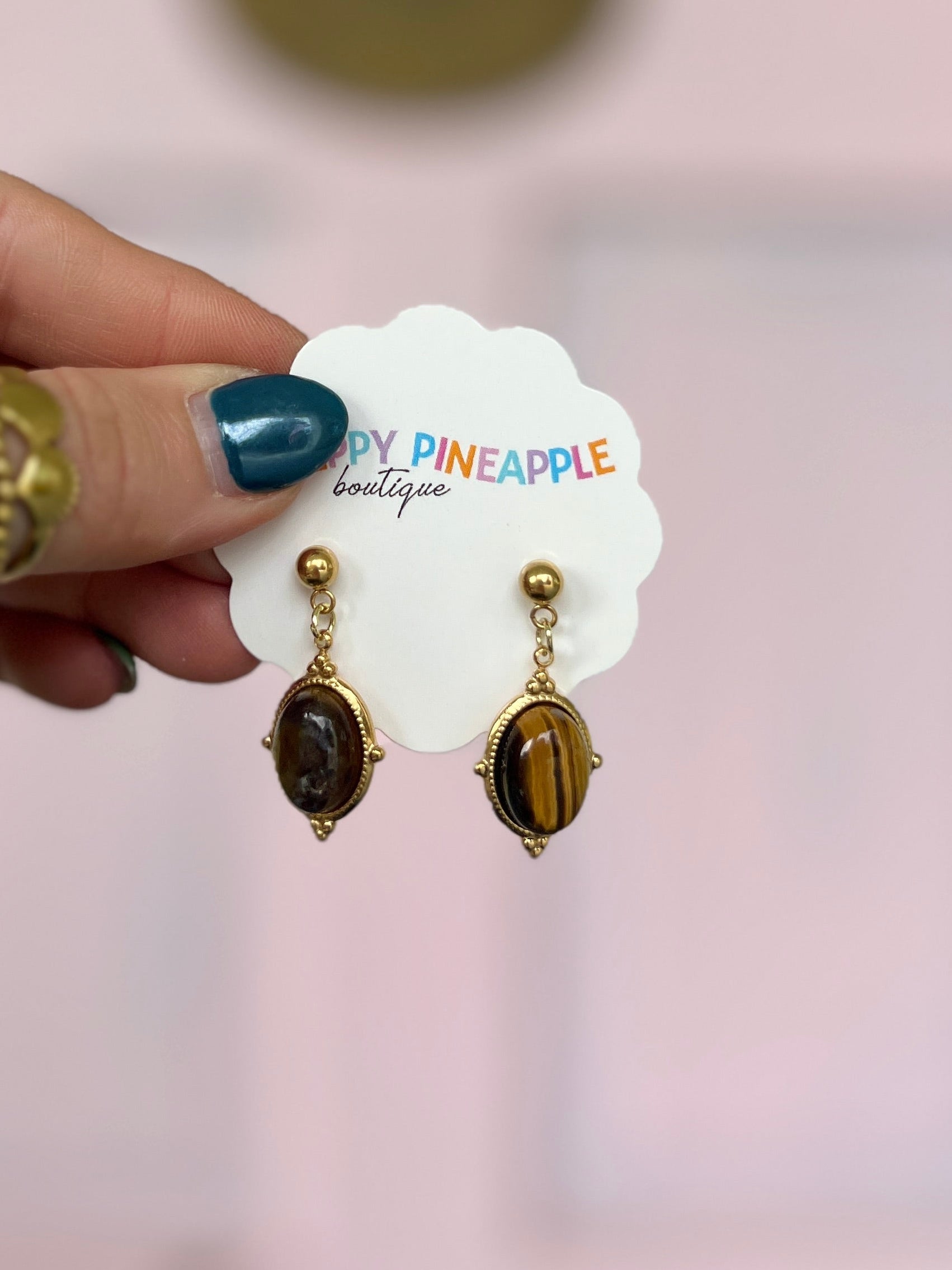 Gold-tone framed oval tiger's eye stone drop earrings