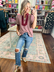 Burgundy and white striped short-sleeve V-neck top with front knot detail