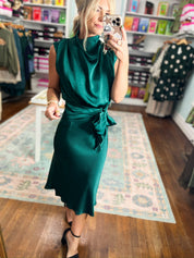 Teal sleeveless midi dress with draped cowl neck and tied waist bow at front.