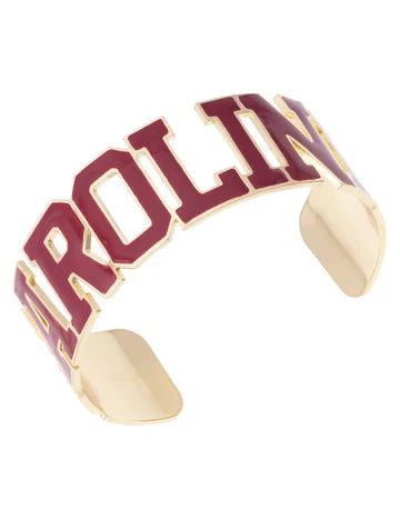 Varsity outline cuff with maroon and cream block lettering and embroidered trim