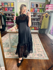 Black chiffon midi dress with short sleeves and gathered ruffle bottom