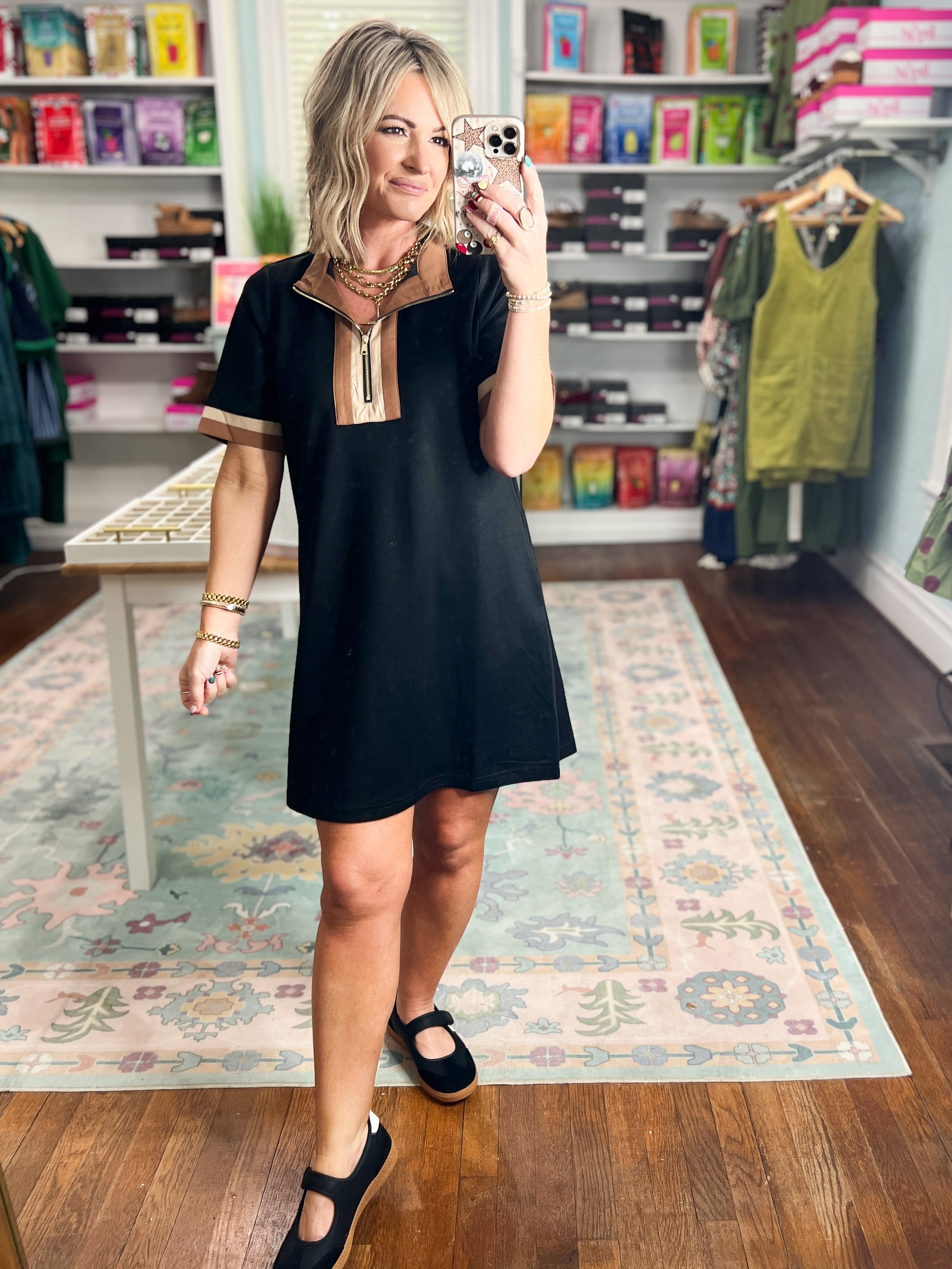 Black casual dress, short sleeves, relaxed fit, light V-neck yoke detail