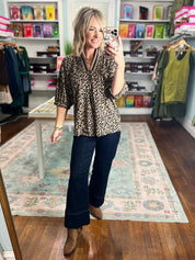 Taupe leopard print pleated blouse top with V-neck and short puff sleeves