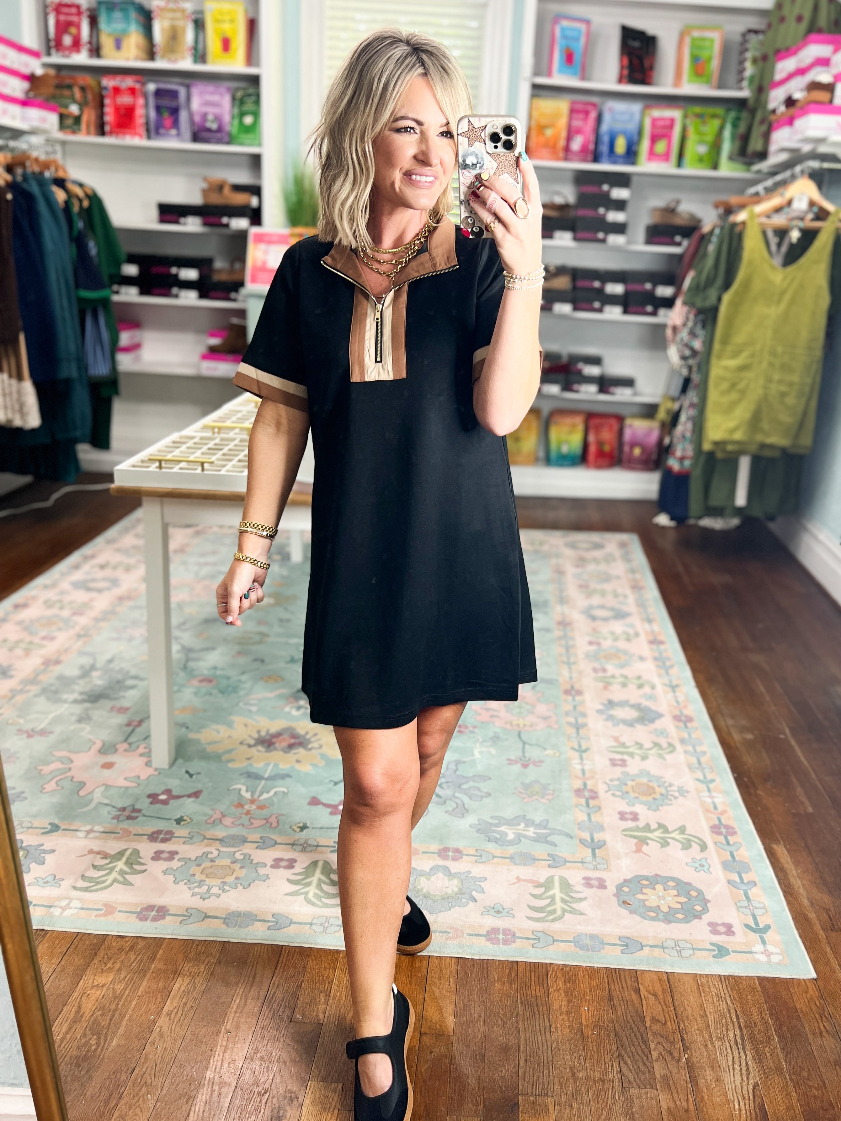 Black short-sleeve casual dress, above-knee length, V-neck light trim yoke