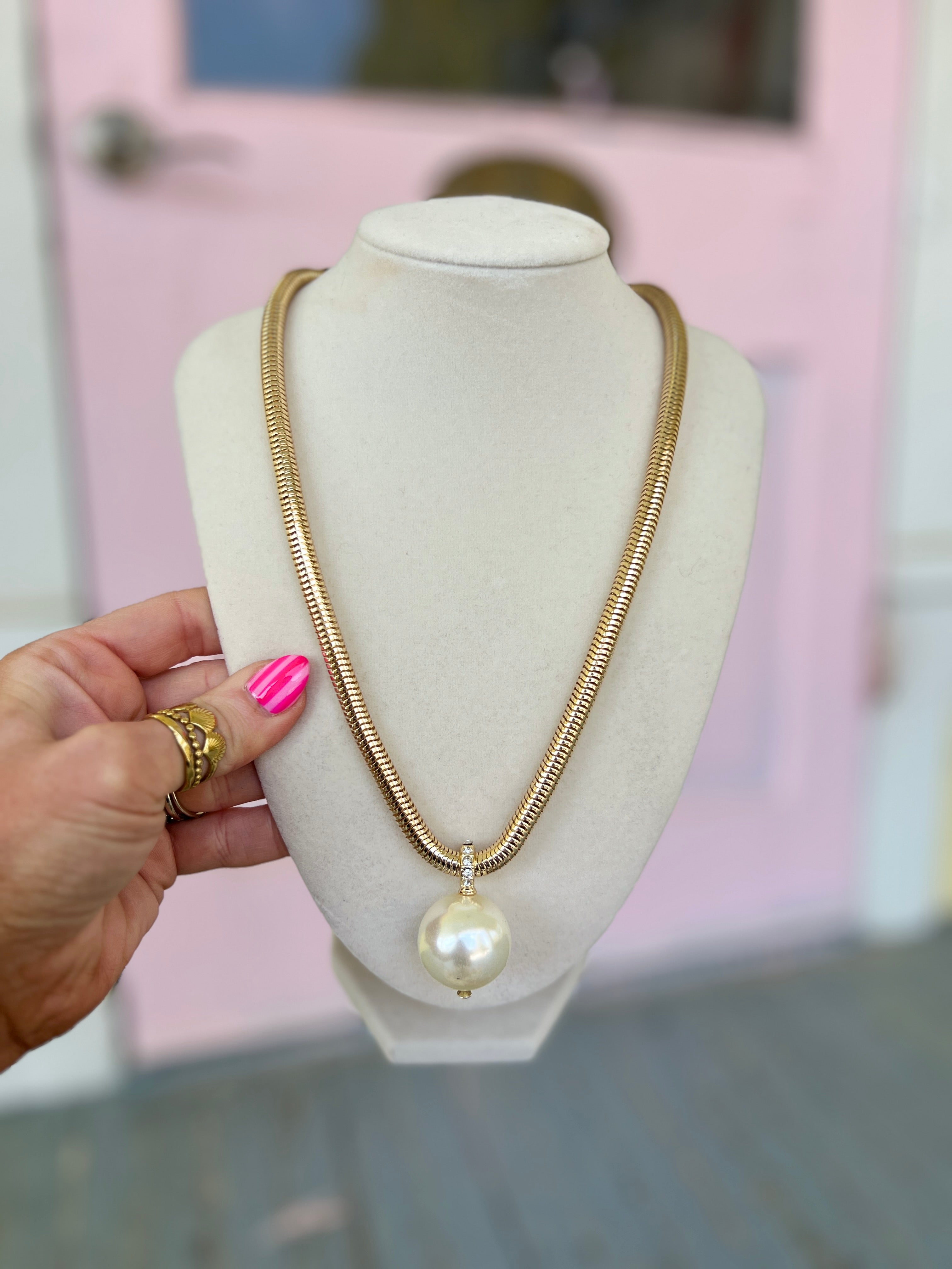 Gold pearl pendant necklace with round pearl drop on chain