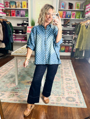 Light blue polka-dot denim button-front shirt, short sleeves, collared neckline