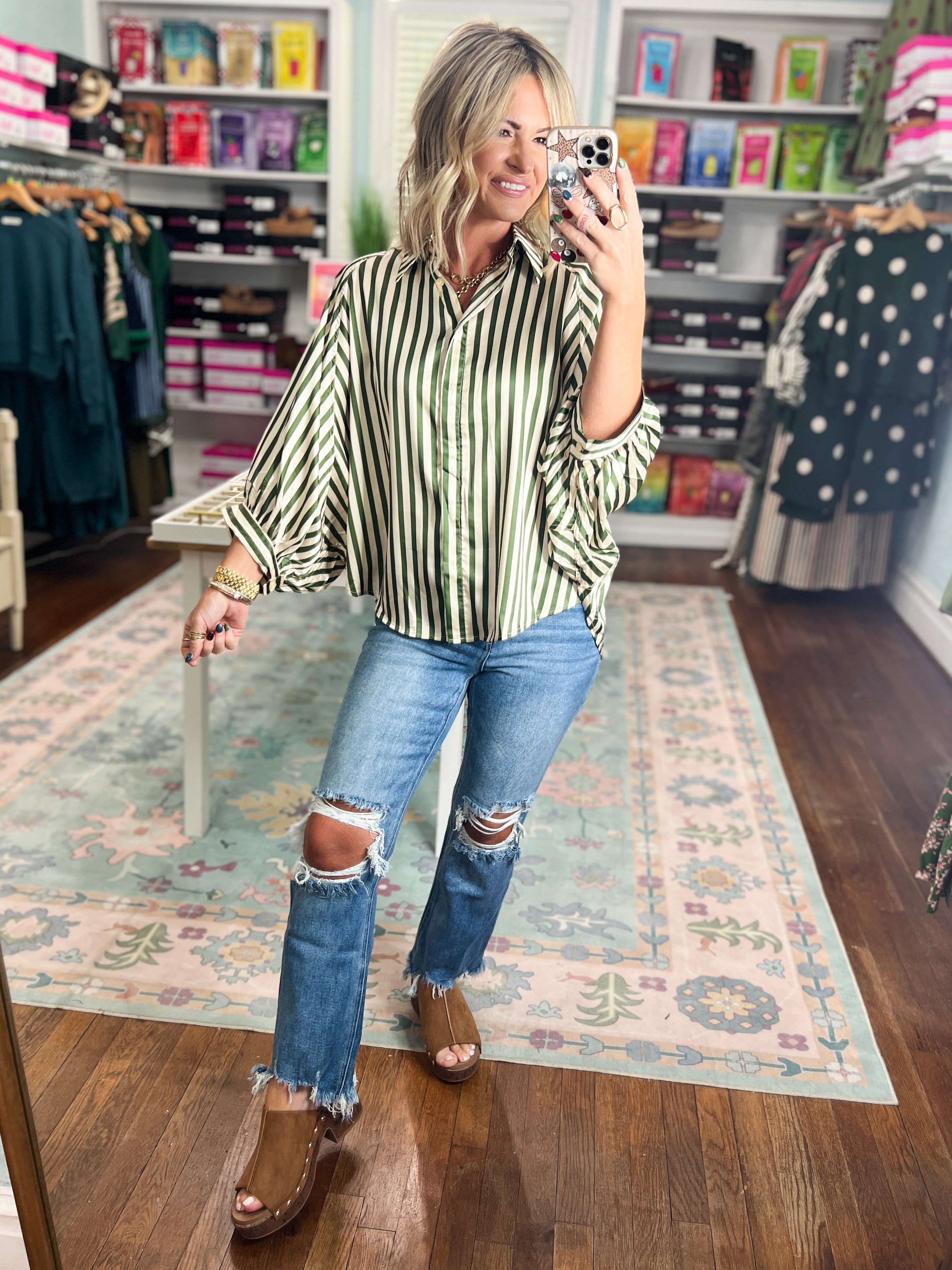 Olive vertical-striped button-down top with pointed collar and long sleeves