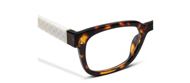 Side view tortoise eyeglass frame with white temple and rectangular lens