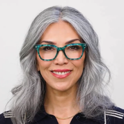 Peepers Buzzworthy turquoise marbled eyeglasses on model, rectangular frames