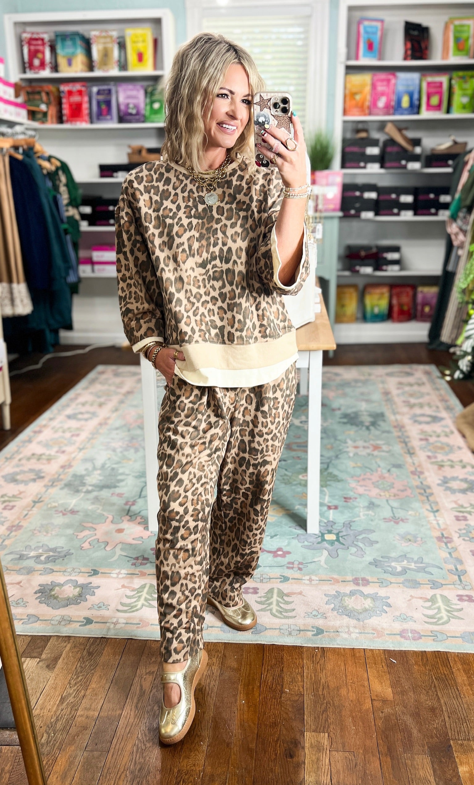 Relaxed animal-print top with ecru hem trim and wide three-quarter sleeves