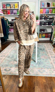 Relaxed animal-print top with ecru hem trim and wide three-quarter sleeves