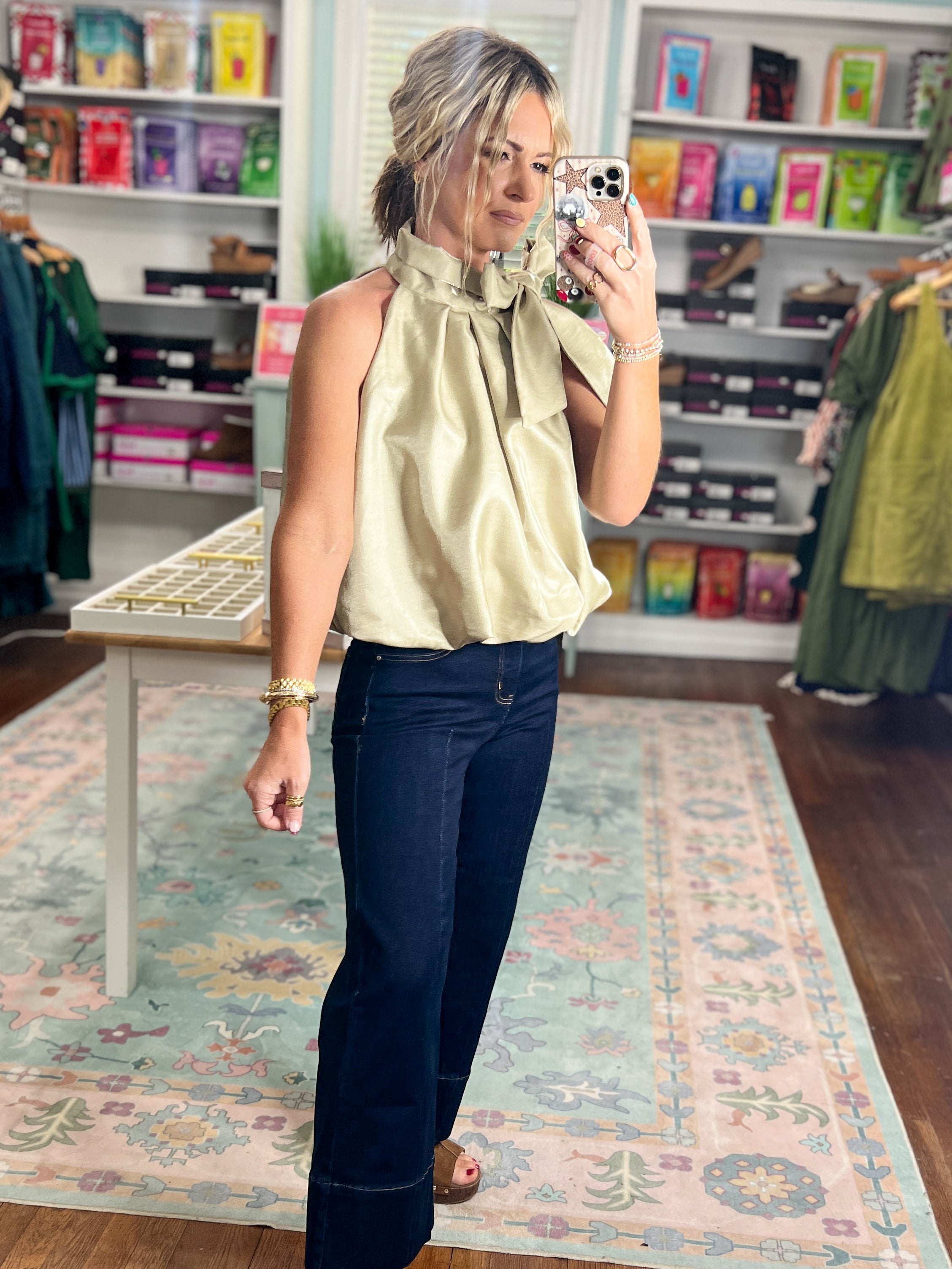 Taupe sleeveless balloon top with gathered neckline and soft pleated front