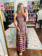 Multicolor plaid tiered maxi dress front view with smocked waist and tiered hem