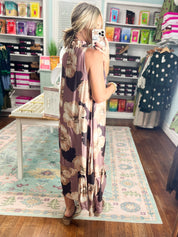 Back view of sleeveless midi dress with burgundy floral print