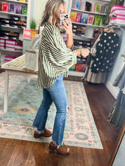 Olive vertical-striped button-down top with pointed collar and long sleeves