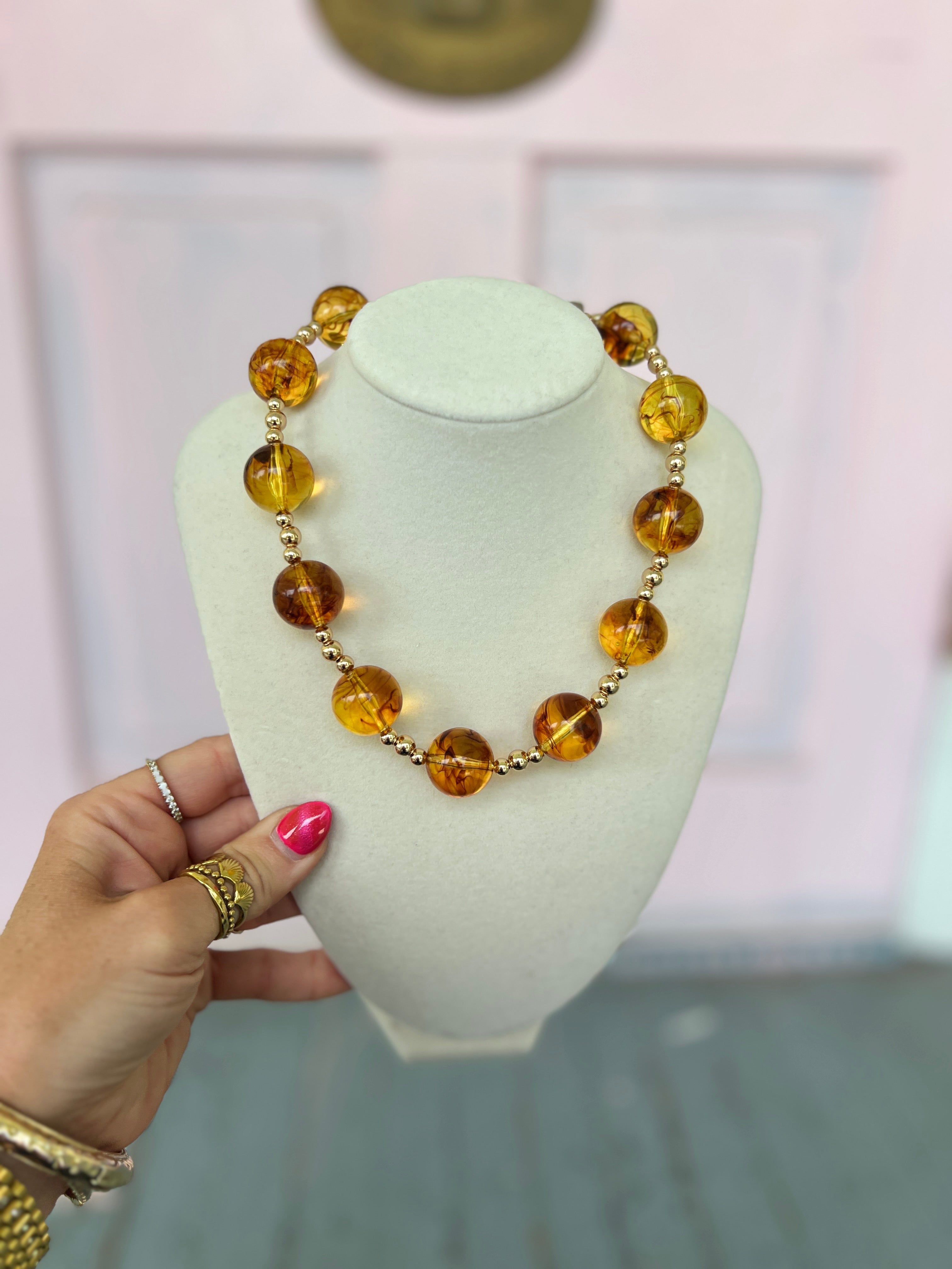 Marble and CCB ball necklace with amber and dark tortoise bead strands