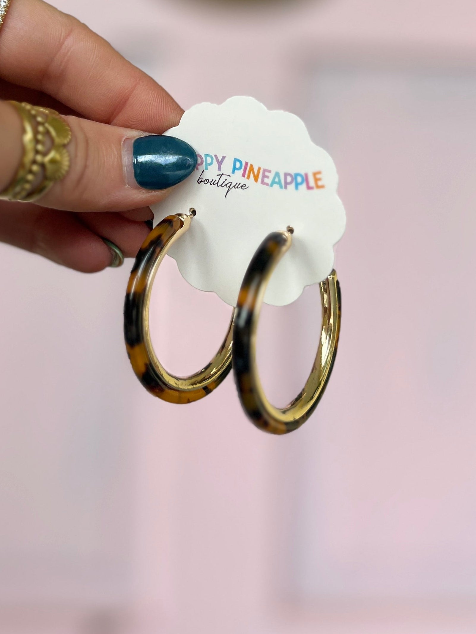 Tortoise acetate and gold-tone metal hoop earrings, pair of medium hoops