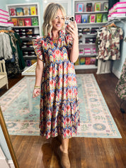 Multicolor tiered midi dress with geometric pattern and short ruffled sleeves