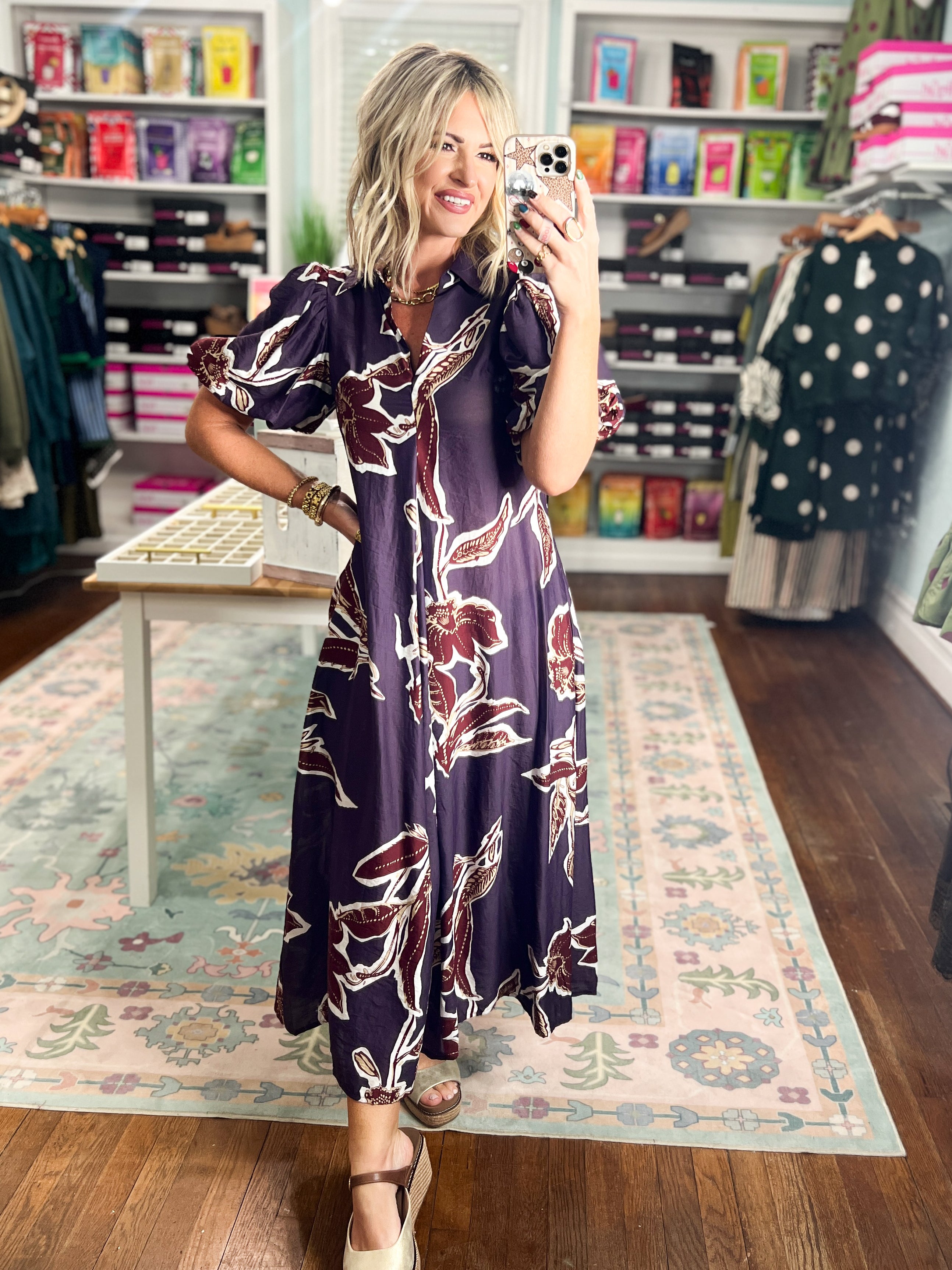 Dark purple puff-sleeve maxi dress with maroon-and-cream floral print and V-neck
