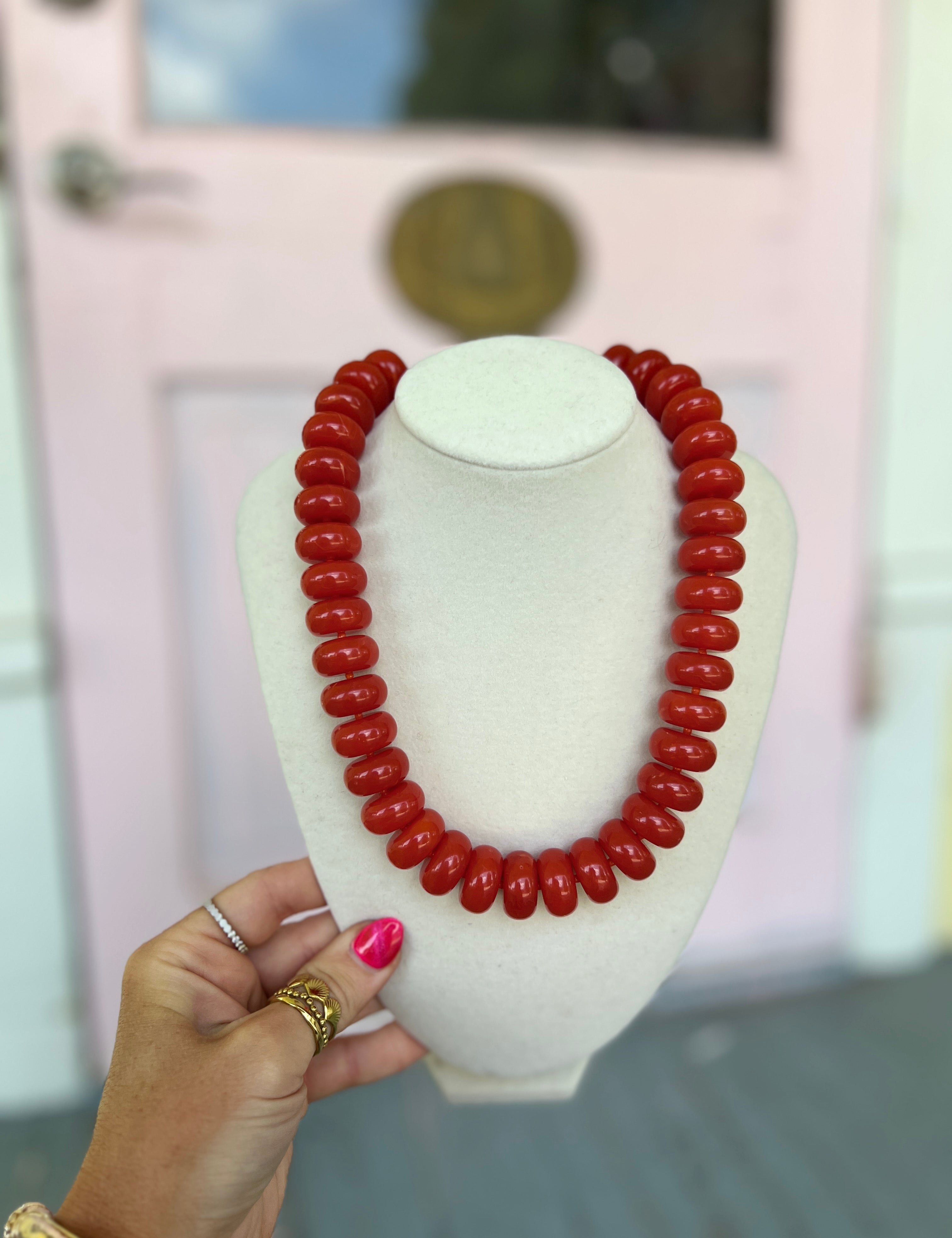 Burnt orange marble rondelle bead necklace with glossy bead strand