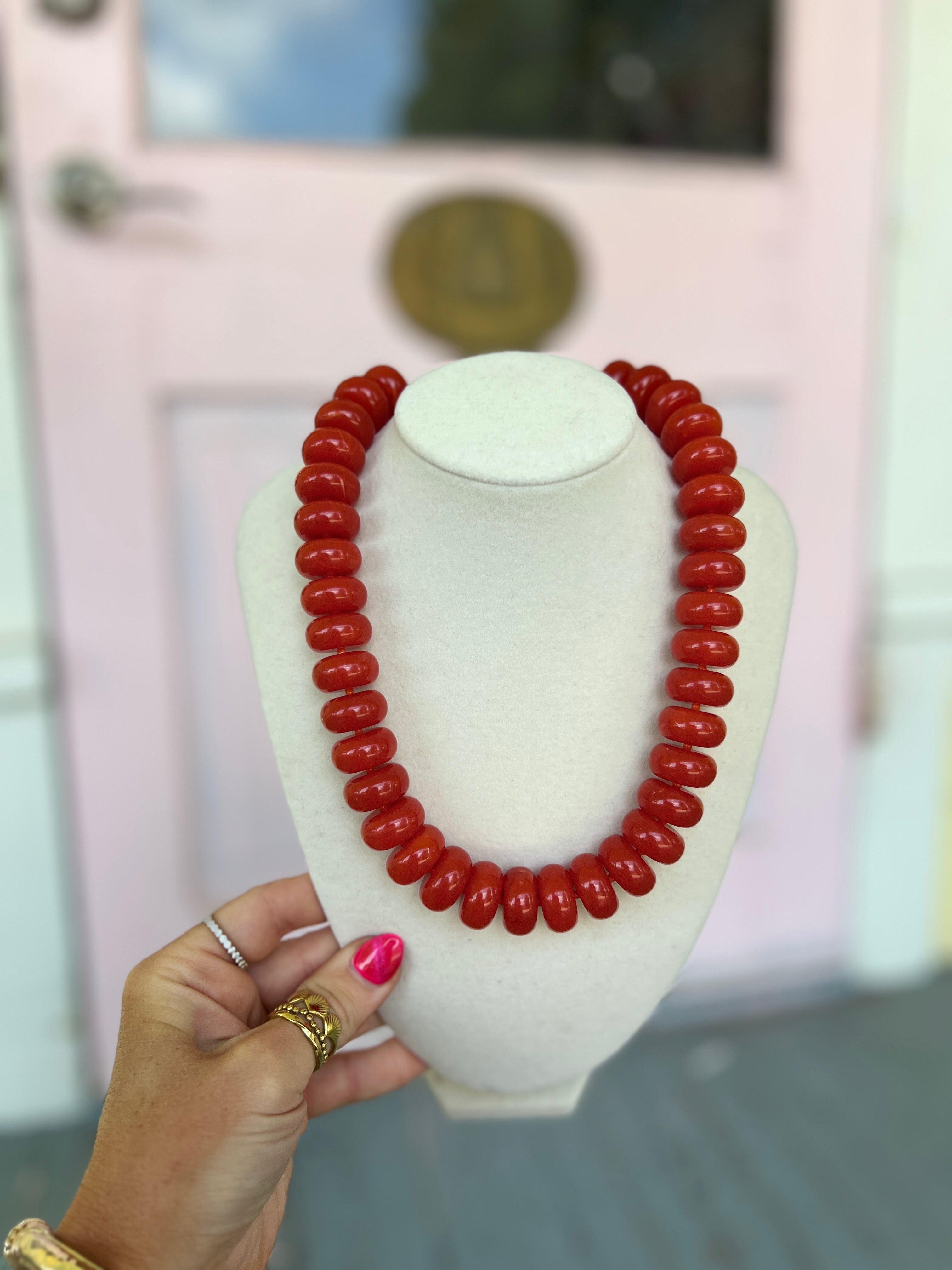 Burnt orange marble rondelle bead necklace with glossy bead strand