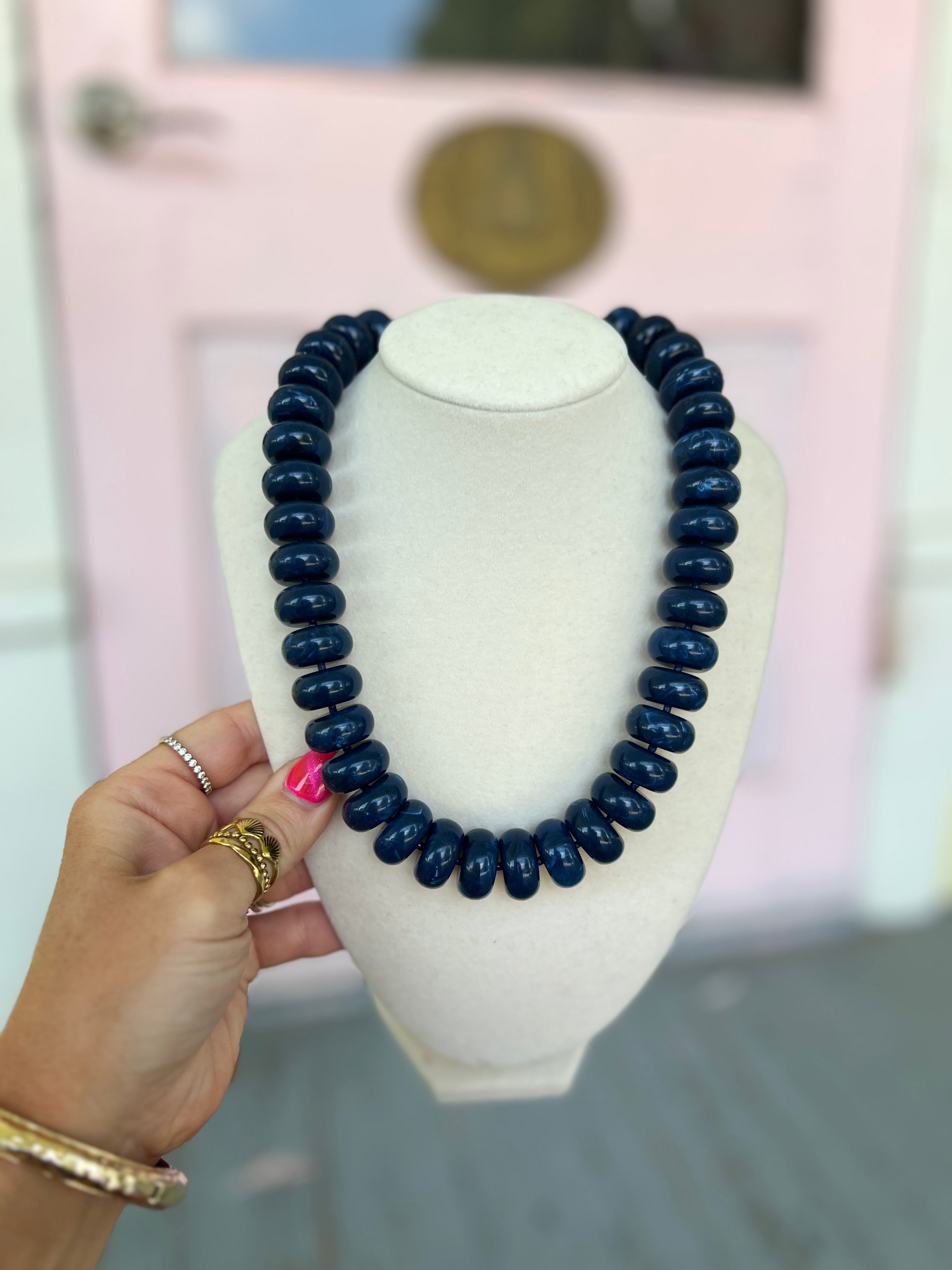 Navy marble rondelle bead necklace with glossy dark blue round beads