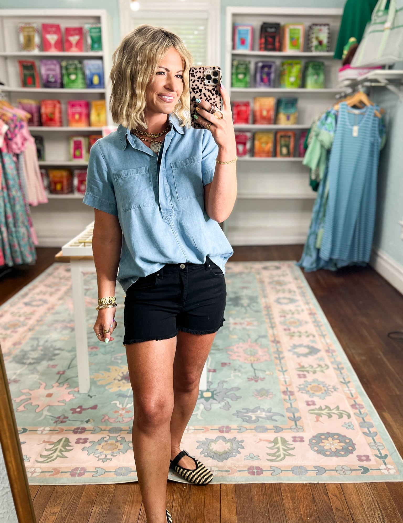 Light denim short-sleeve tunic top with pointed collar and front buttons