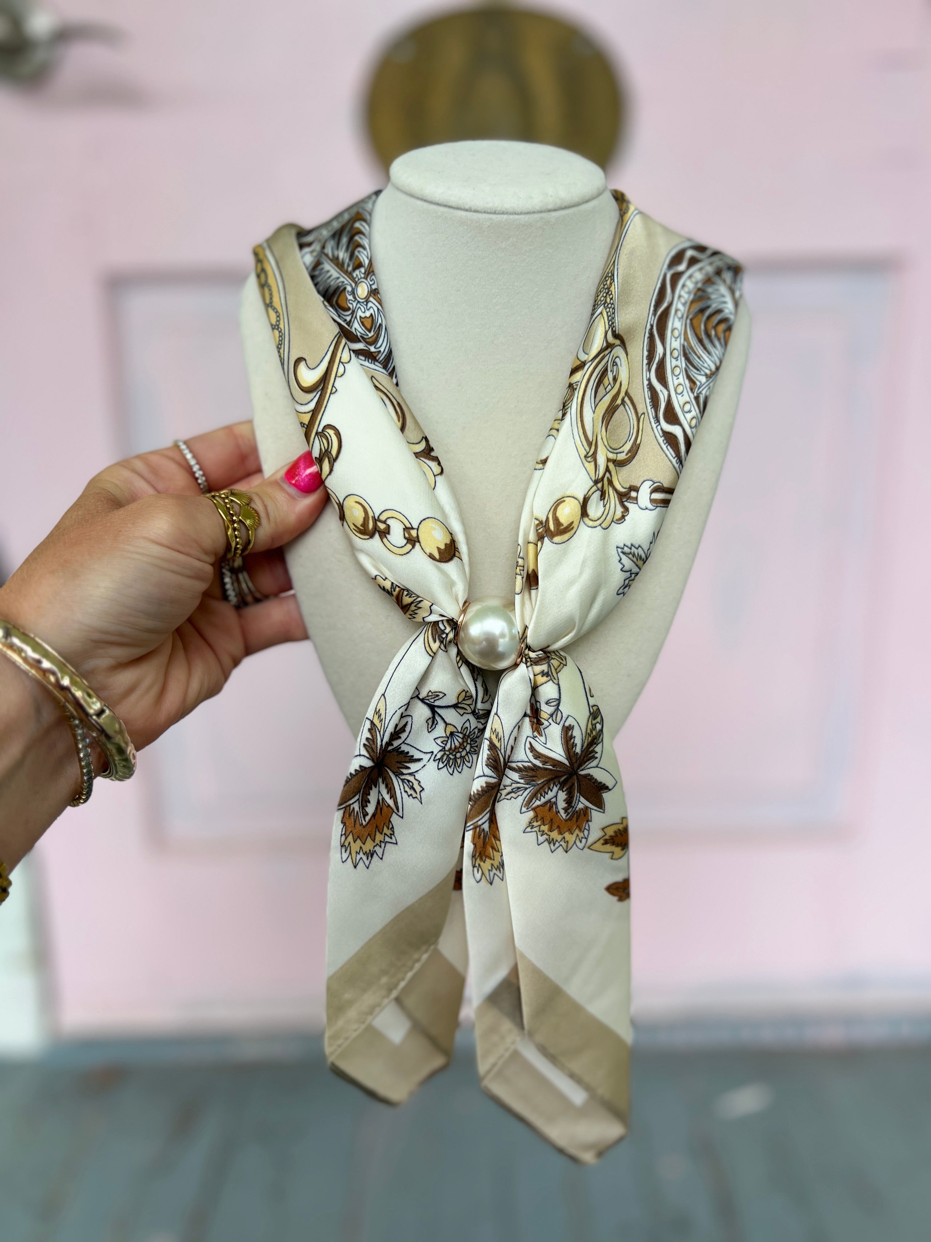 Pearl scarf necklace with cream patterned scarf and central white pearl pendant