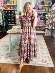 Multicolor tiered midi dress with geometric print and short ruffled sleeves, full body