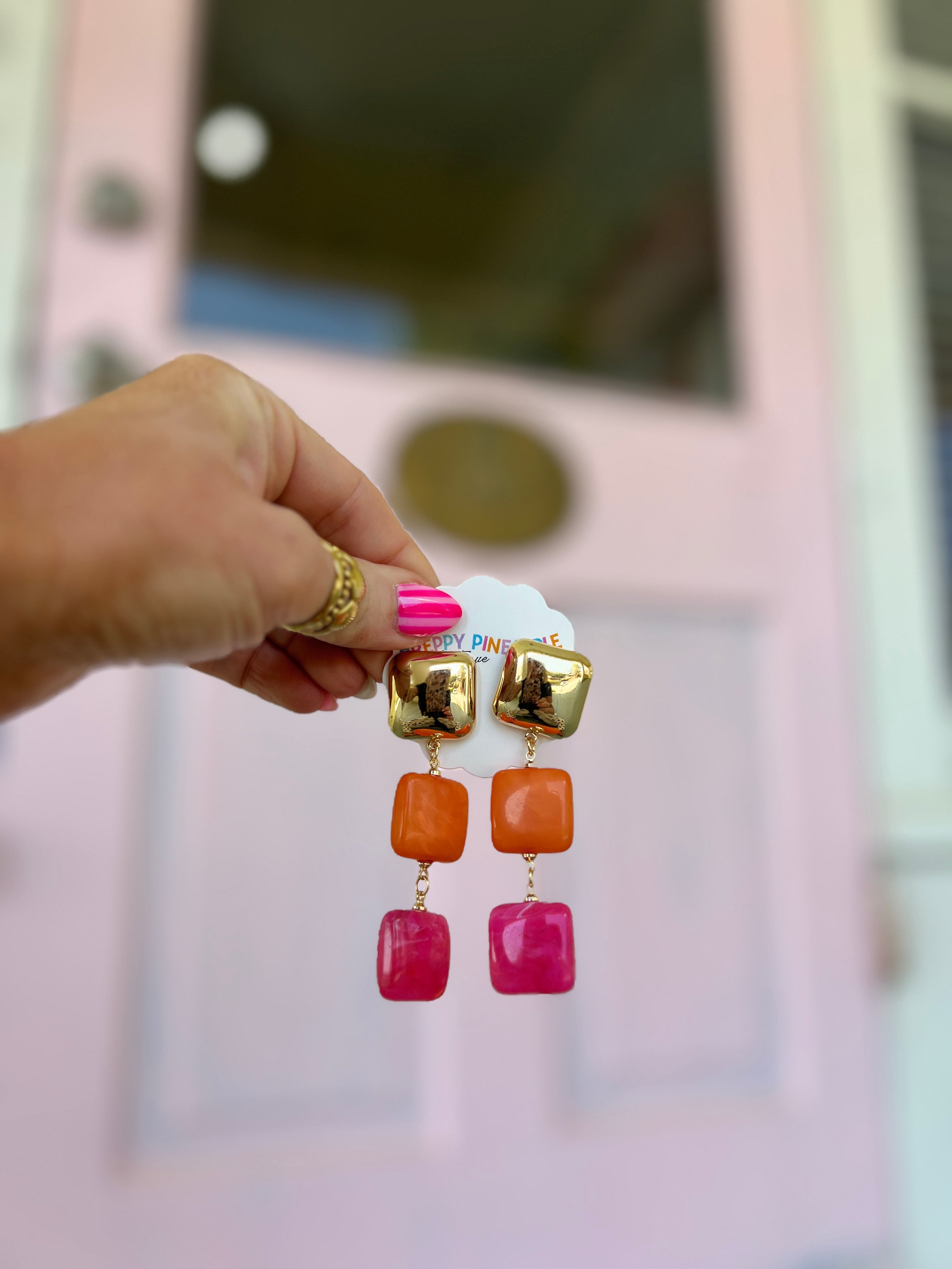Square acrylic drop earrings with gold-tone metal, orange and pink stacked squares