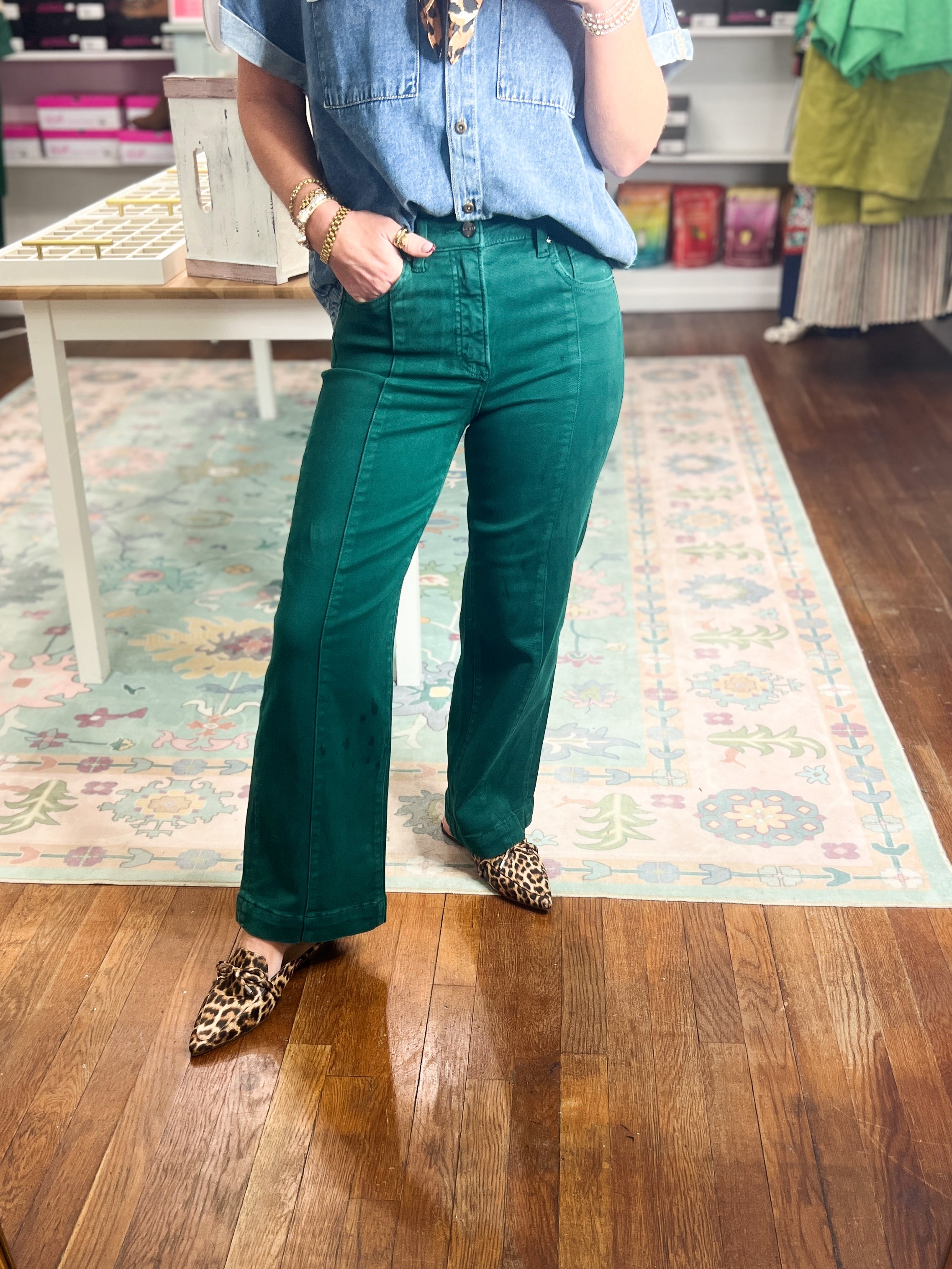 Hunter green high-rise wide-leg crop pants with flared hem and back yoke