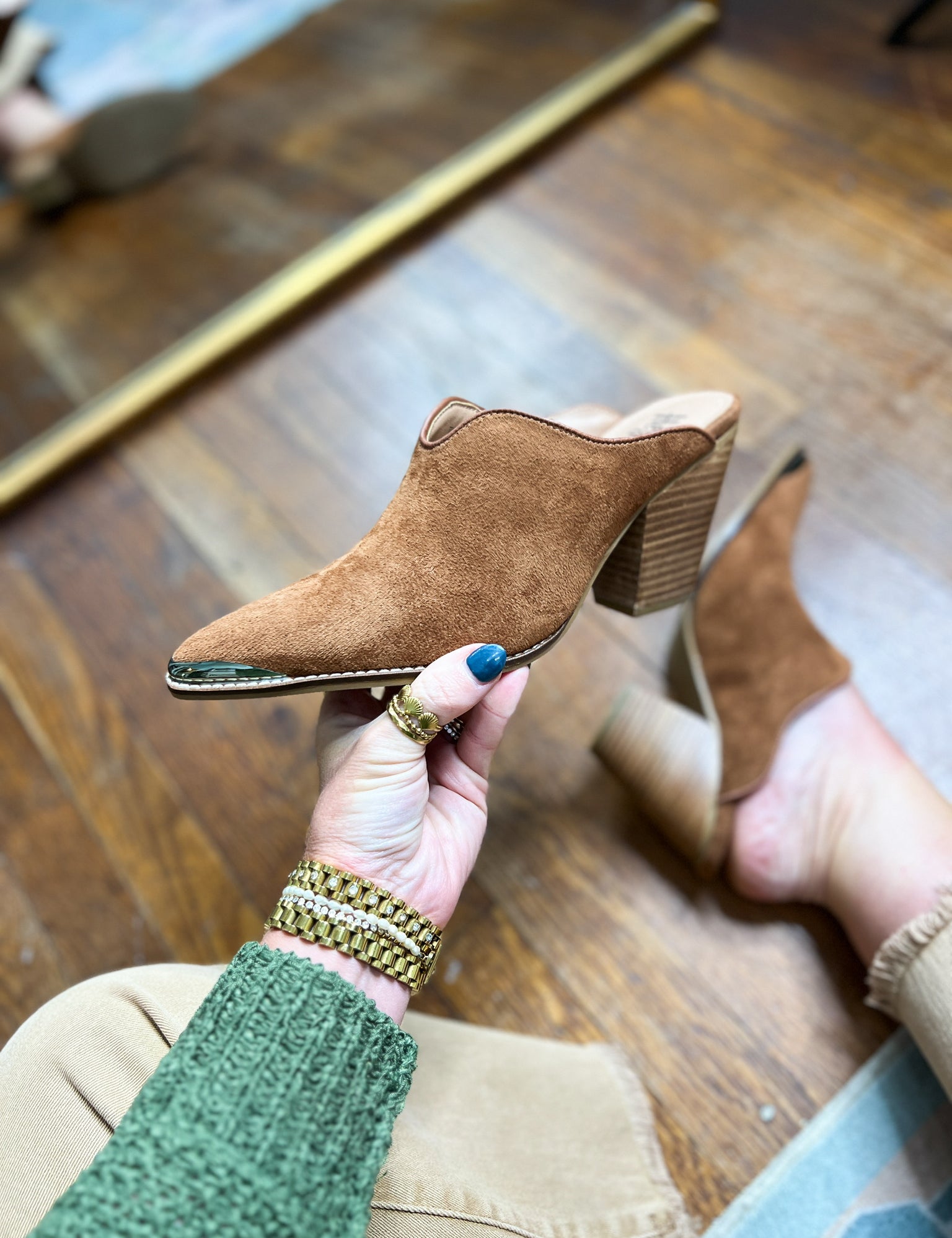 Tobacco brown faux suede mule with open heel, block heel, and teal-edged sole
