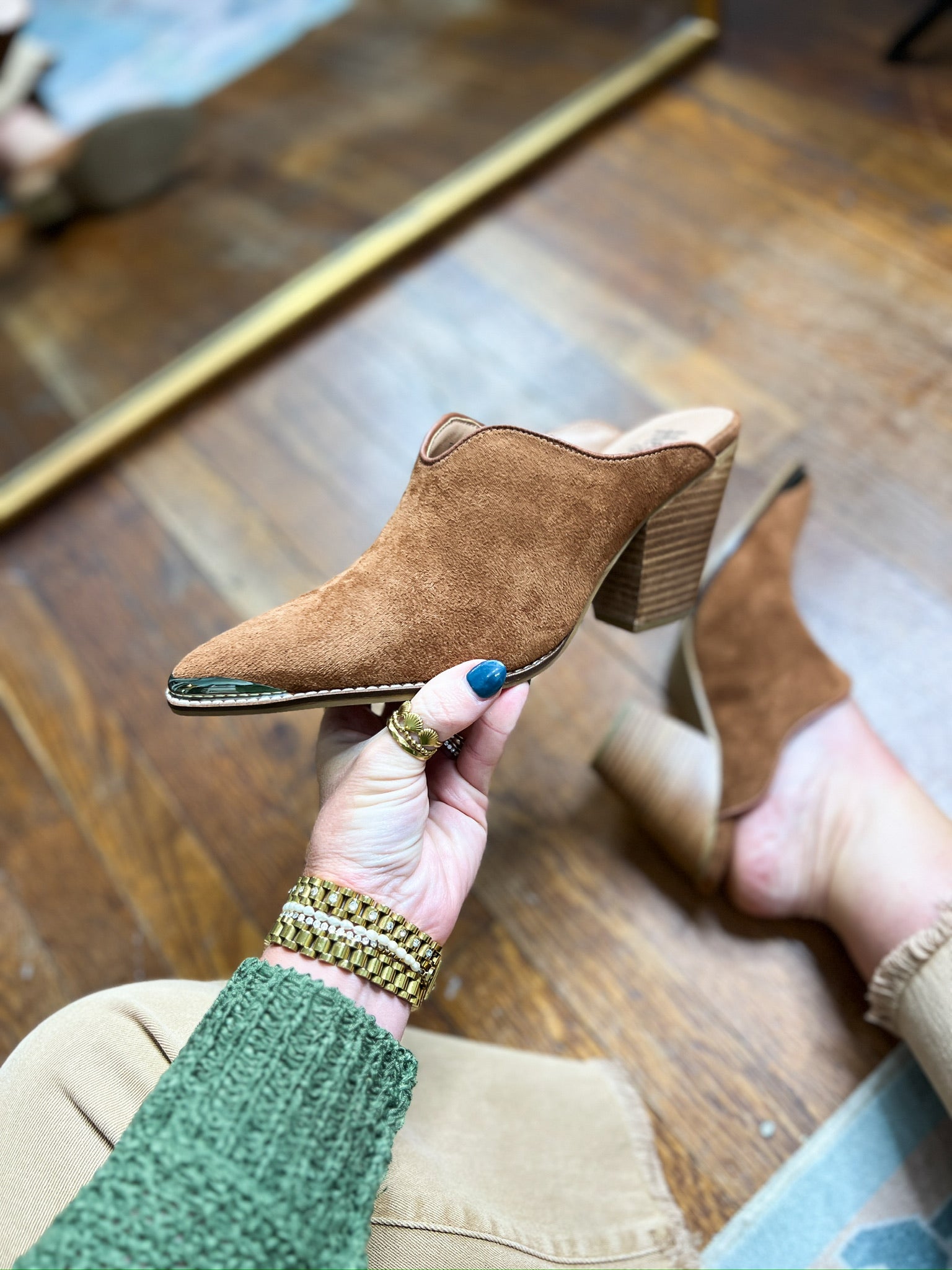 Tobacco brown faux suede mule with open heel, block heel, and teal-edged sole