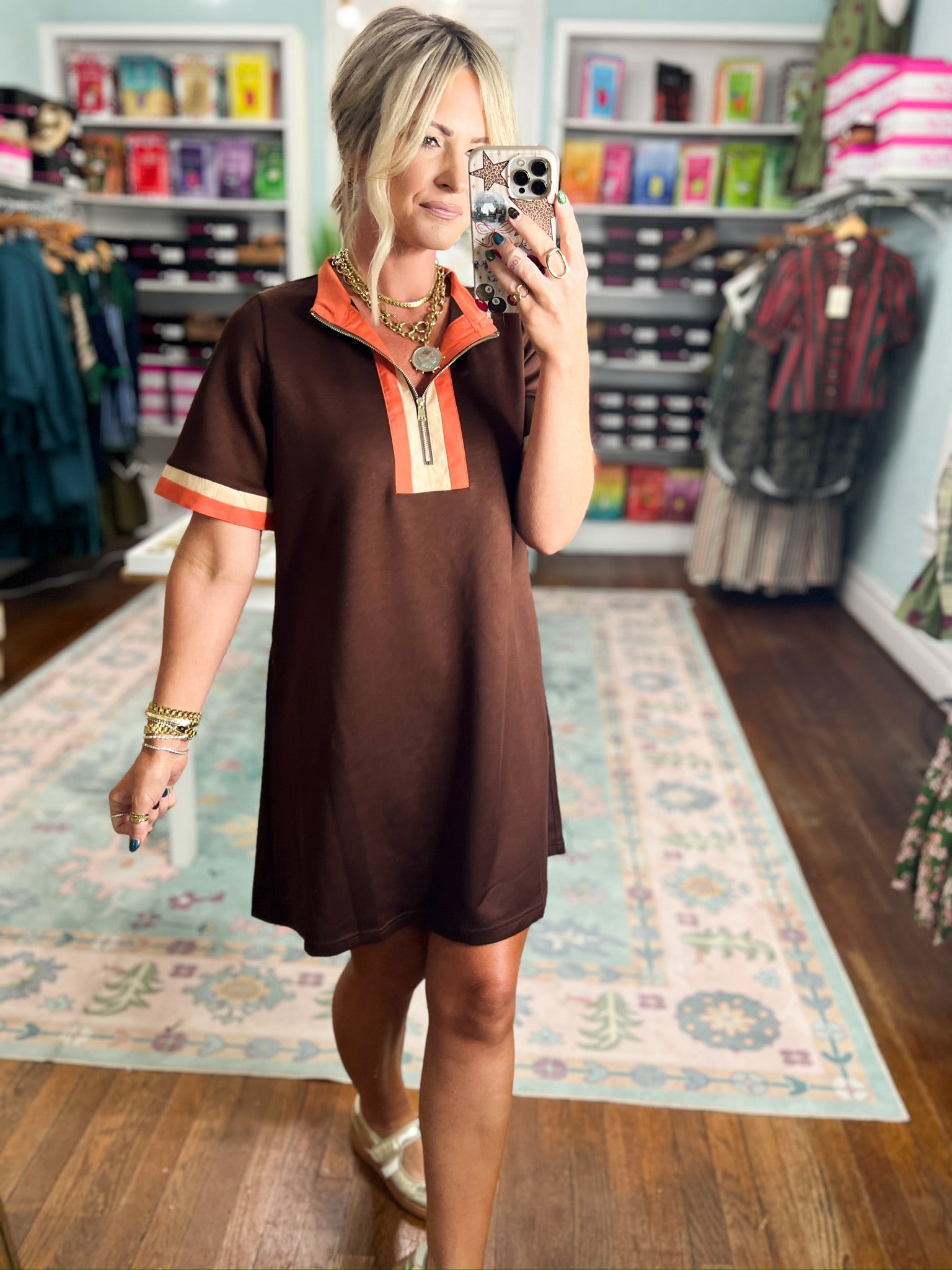 Brown casual dress with orange-trim collar, short sleeves, and knee-length hem