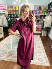 Wine midi dress with button front, short sleeves, and gathered skirt detail