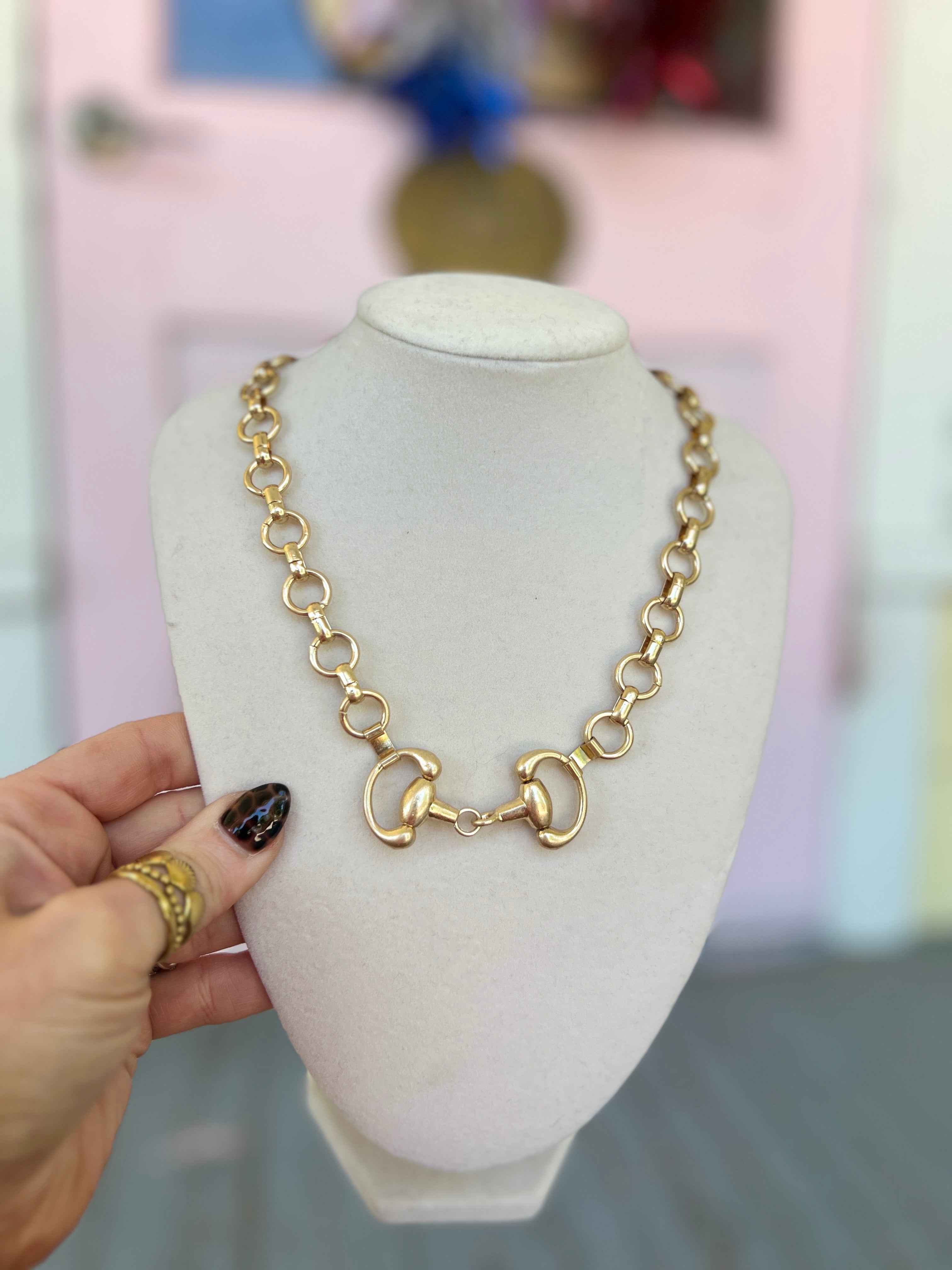 Vintage gold-tone linked horse bit necklace set with chain and toggle clasp