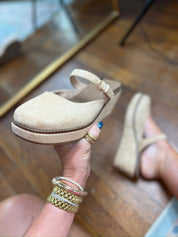 Camel faux suede mule with adjustable buckle strap and stitched edge sole