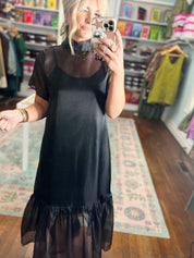 Black chiffon midi dress with sheer top, short sleeves, ruffled hem