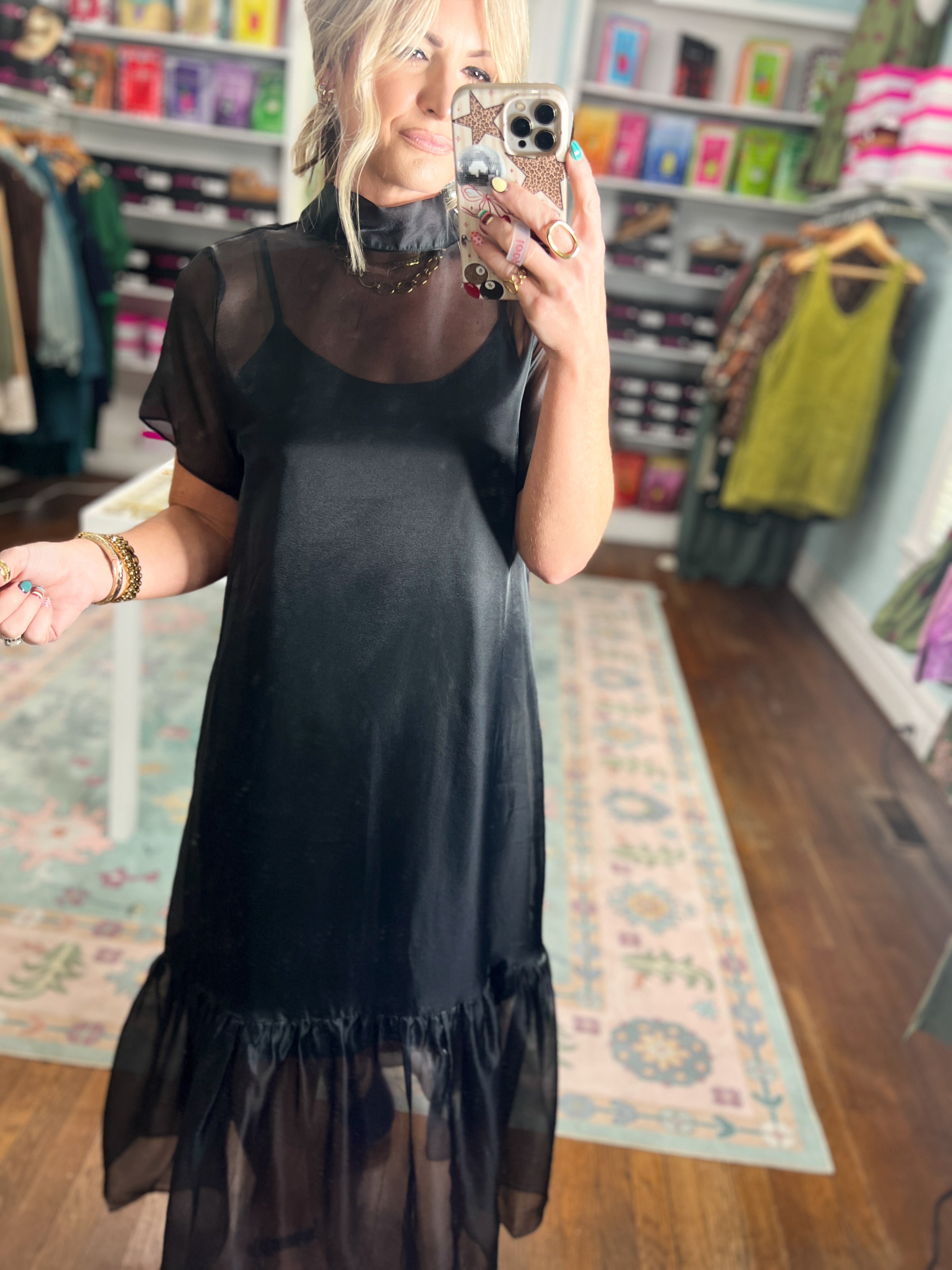 Black chiffon midi dress with sheer top, short sleeves, ruffled hem