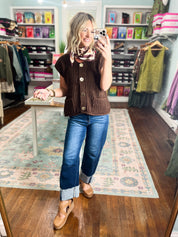 Chocolate brown ribbed sweater vest with button front and patch pockets