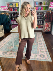 Brown straight pants with frayed ankle hem