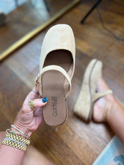 Camel faux suede mule with side buckle strap, slip-on design